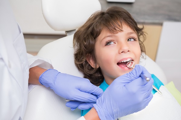 Scheduling Dental Checkups around Your Family’s Busy Summer