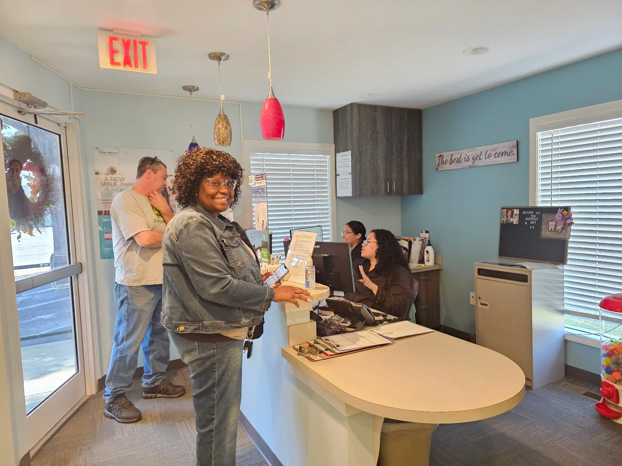 Patient checking in at Accent Family Dentistry reception