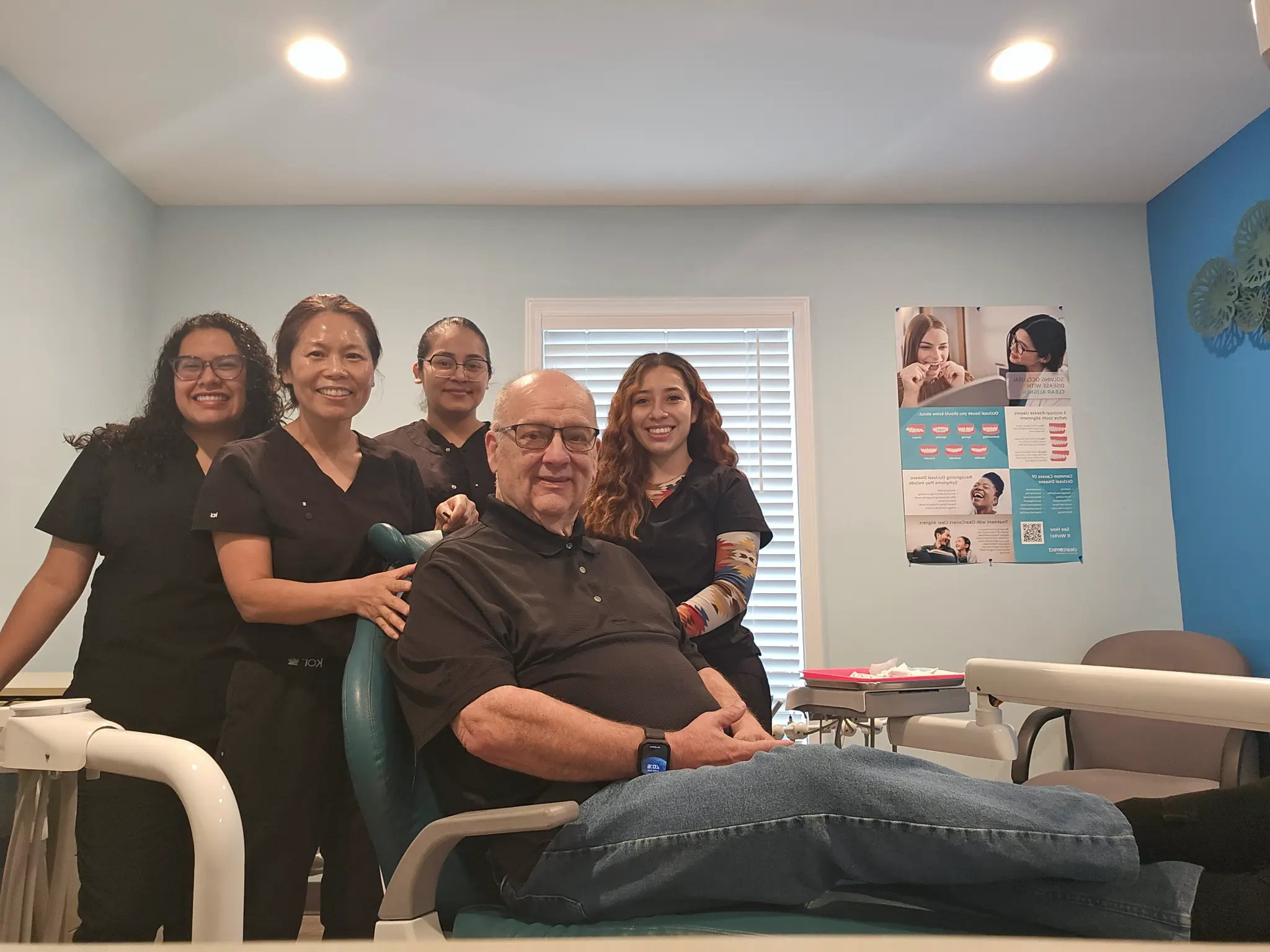 Dr. Gong and her team with a patient at Accent Family Dentistry